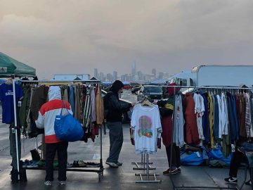 Vendors and shoppers at the Alameda Point Antiques Faire